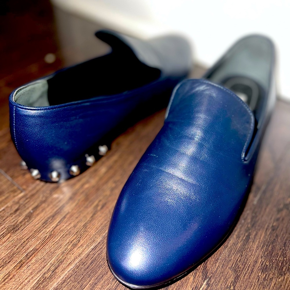 Navy blue balenciaga loafers with stud detailing